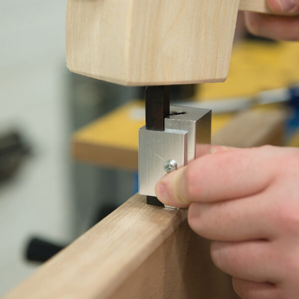 For knocking rounded corners out of a routed hinge recess